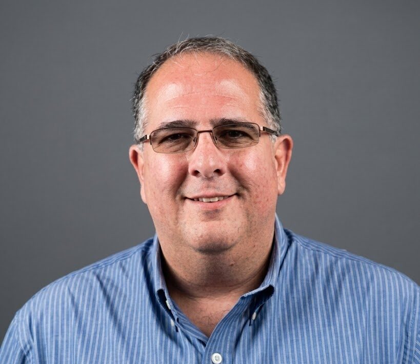 A man smiling, Andy Hernandez
