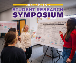 students presenting at symposium