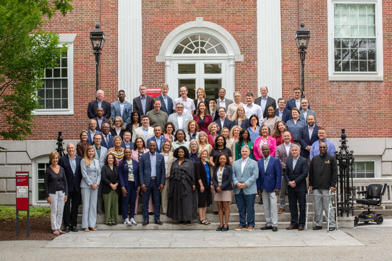 A group of people that are presidents of universities from around the world at a Harvard Presidential Leadership Seminar.