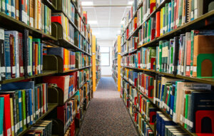 Long shot of library stacks of books